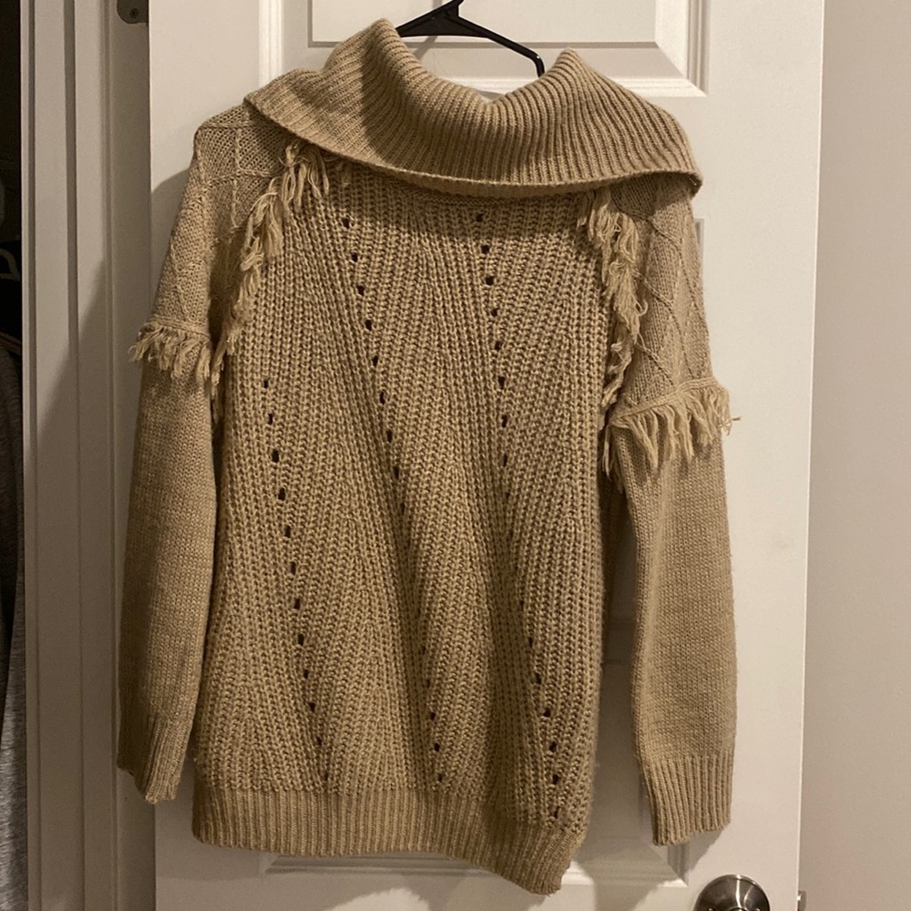 Cute cowl neck sweater with fringes